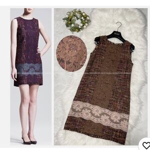 DOLCE&GABBANA
Burgundy wool cocktail dress.